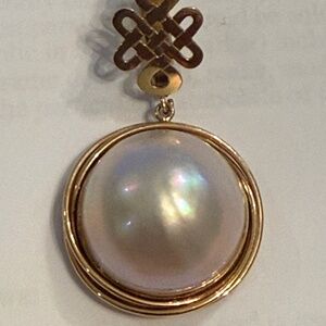 large mobe pearl pendant enhancer 14k yellow gold.hinged love knot